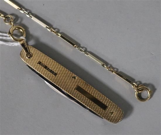 A 9ct gold fancy link watch chain and a 9ct gold-mounted penknife